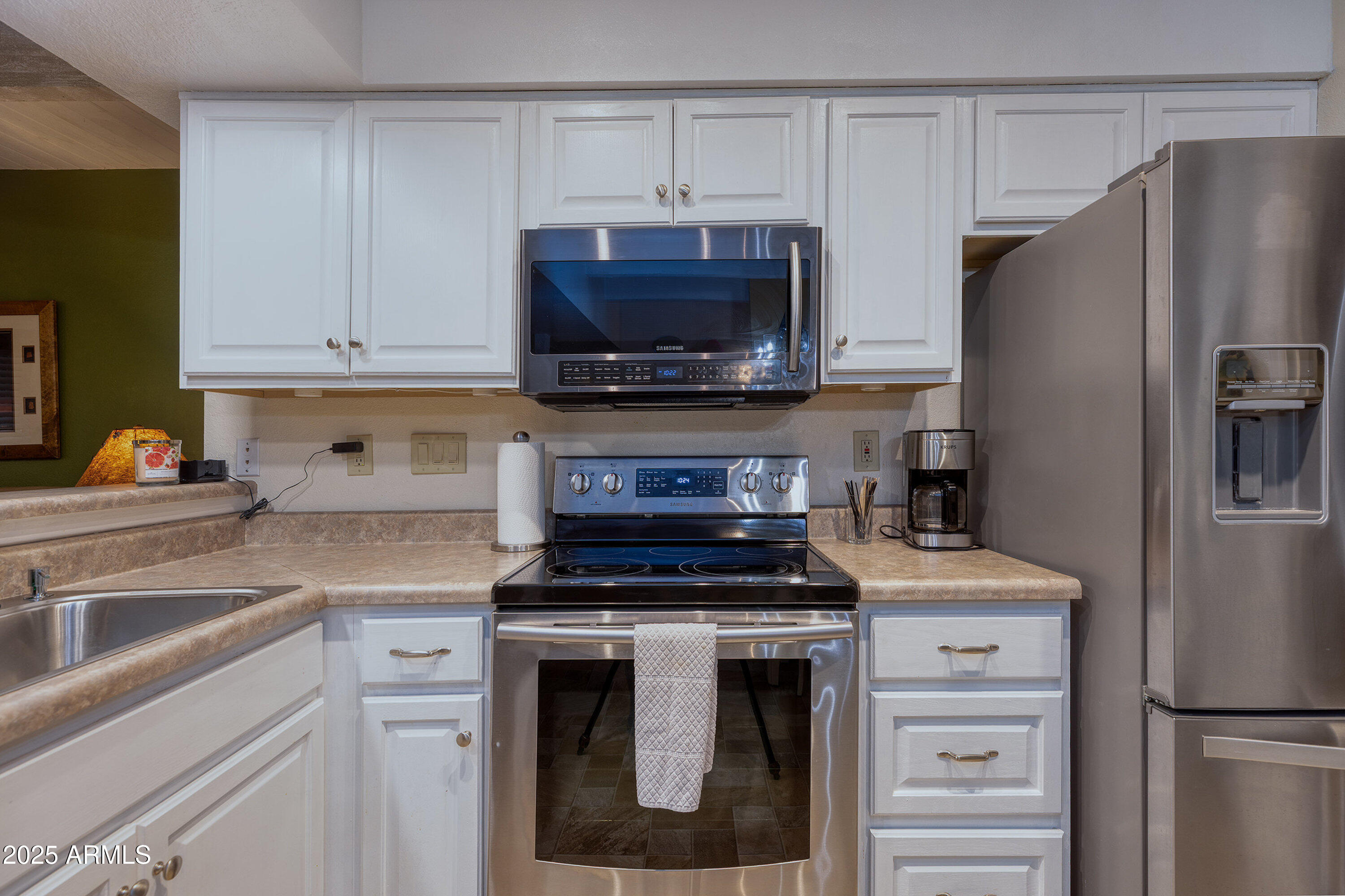 2641 Sports Village Loop, Unit 2 Pinetop, AZ 85935 - Photo 13 of 33 a kitchen with a refrigerator stove and microwave