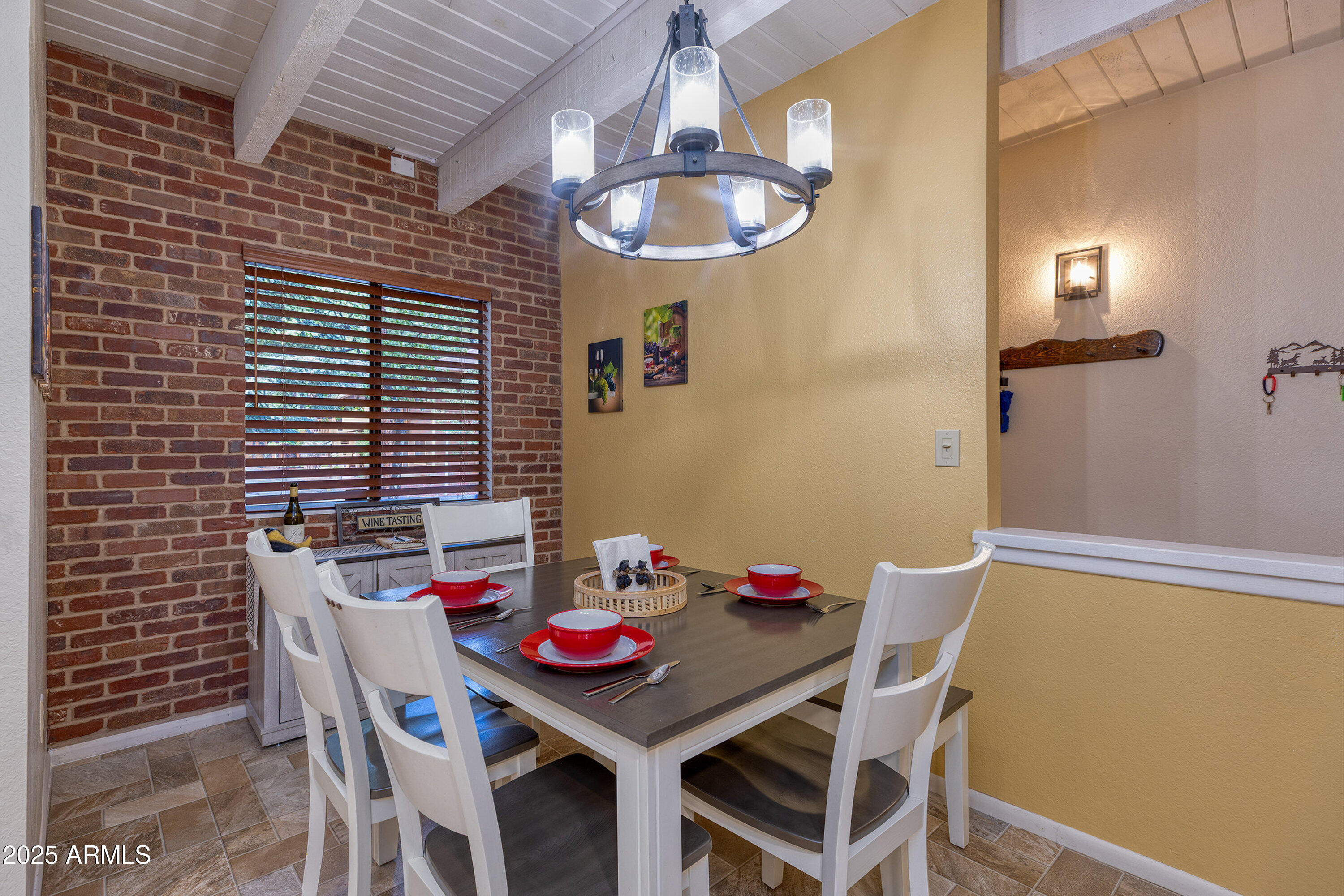 2641 Sports Village Loop, Unit 2 Pinetop, AZ 85935 - Photo 16 of 33 a view of a dining room with furniture and window