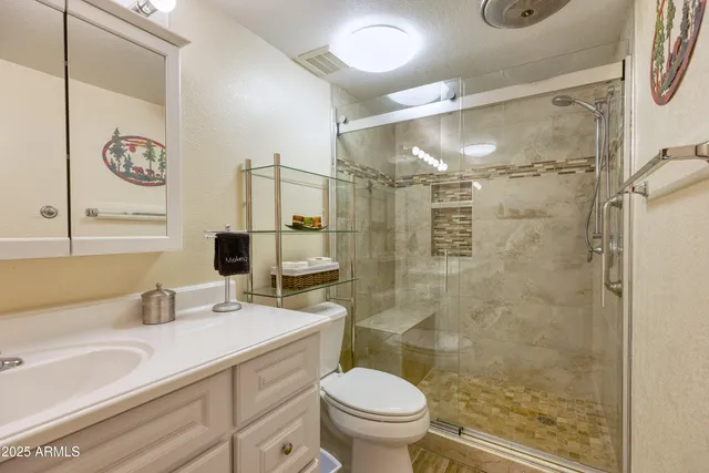 a kitchen with a sink and a refrigerator