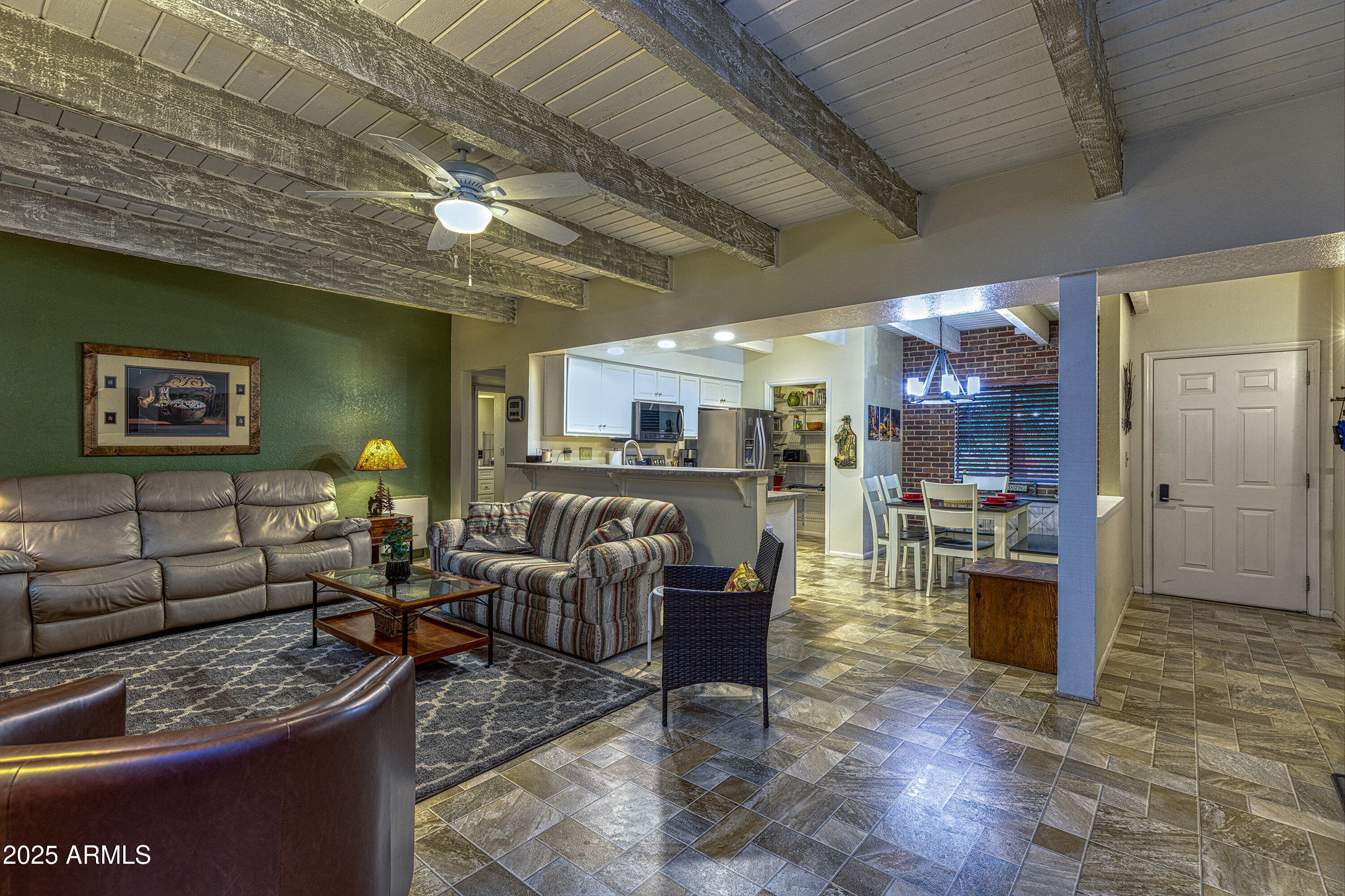 2641 Sports Village Loop, Unit 2 Pinetop, AZ 85935 - Photo 10 of 33 a living room with furniture and a wooden floor