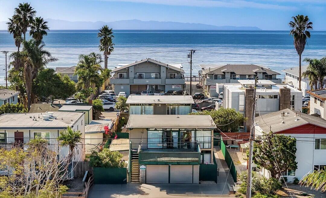 6615 Sabado Tarde Road Goleta, CA 93117 - Photo 1 of 1 a front view of a building with garden