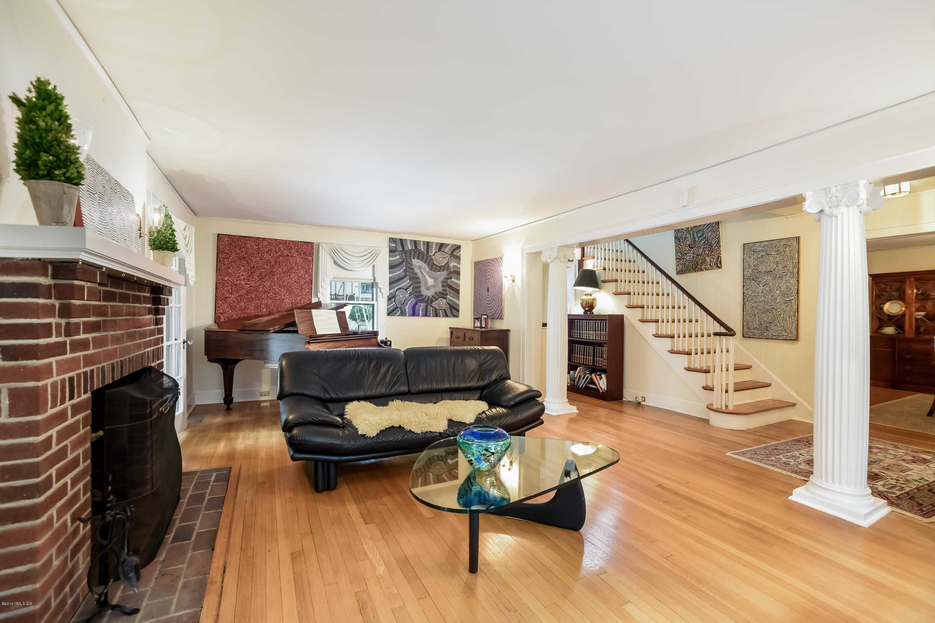 12 Old Post Road Cos Cob, CT 06830 - Photo 3 of 34 a living room with furniture and a fireplace