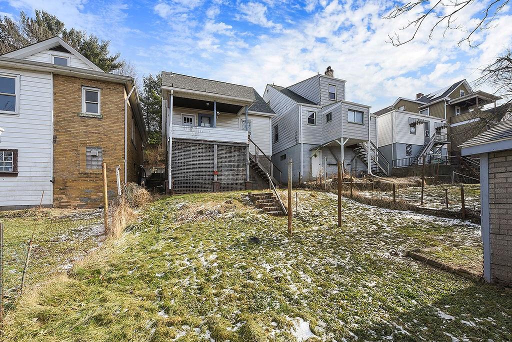 825 Pine Street Ambridge, PA 15003 - Photo 20 of 21 a front view of a house with a yard