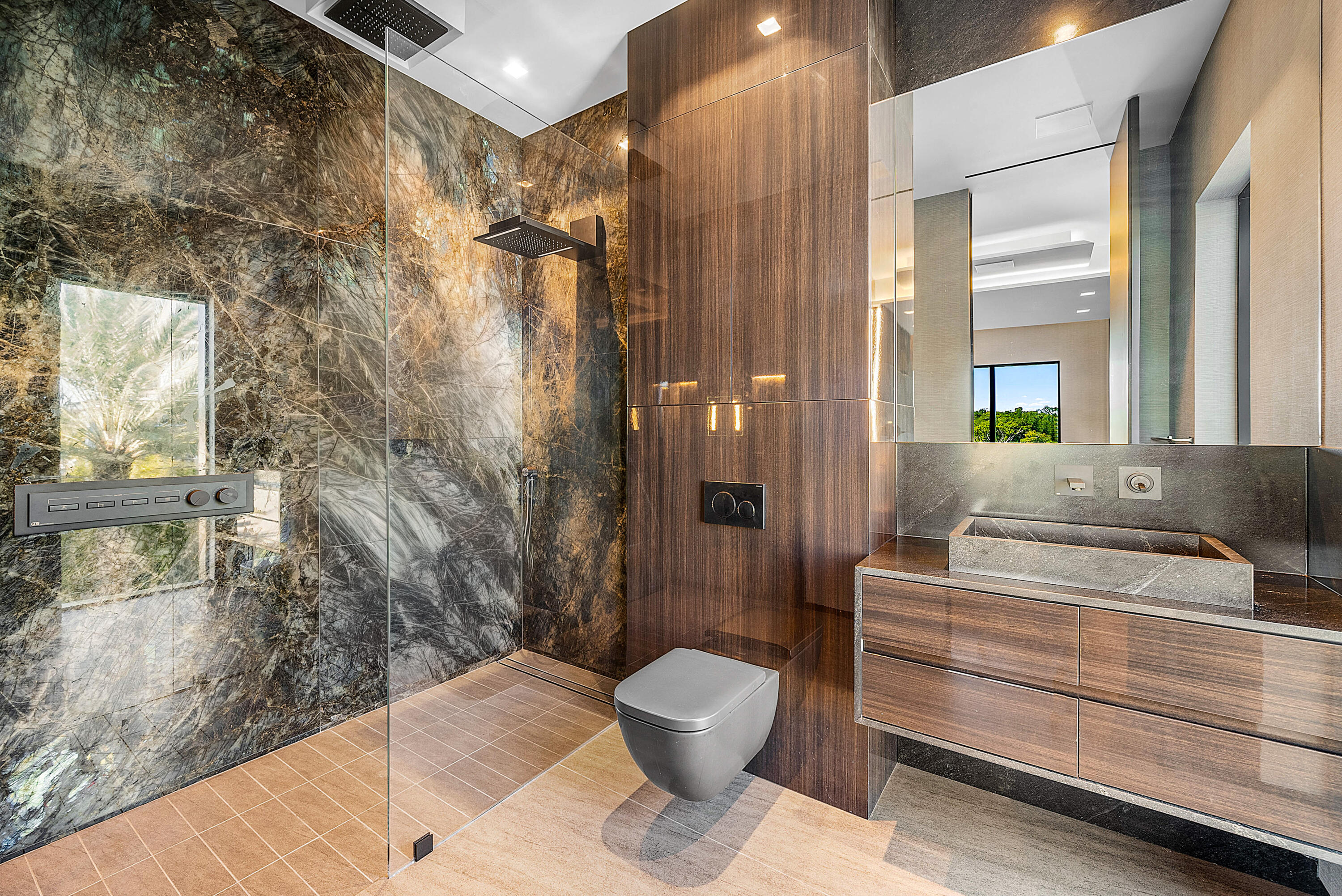 2934 Northeast 8th Avenue Boca Raton, FL 33431 - Photo 81 of 116 a bathroom with a sink toilet and shower