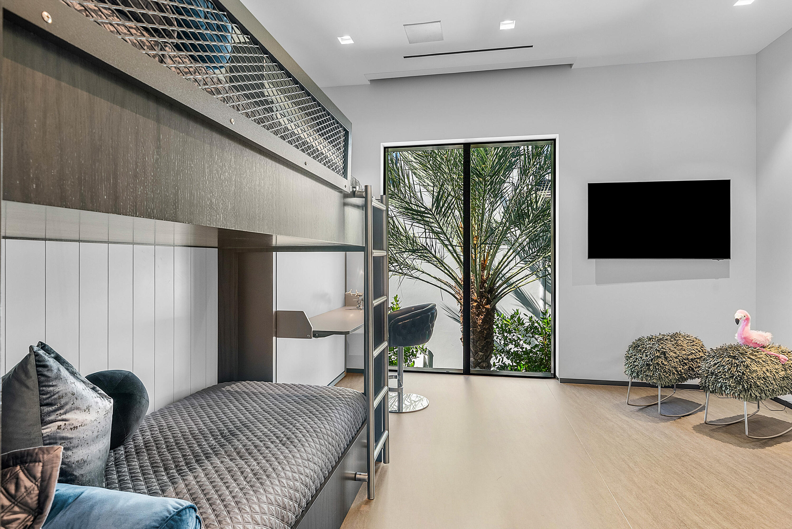 2934 Northeast 8th Avenue Boca Raton, FL 33431 - Photo 86 of 116 a bedroom with a bed and flat screen tv