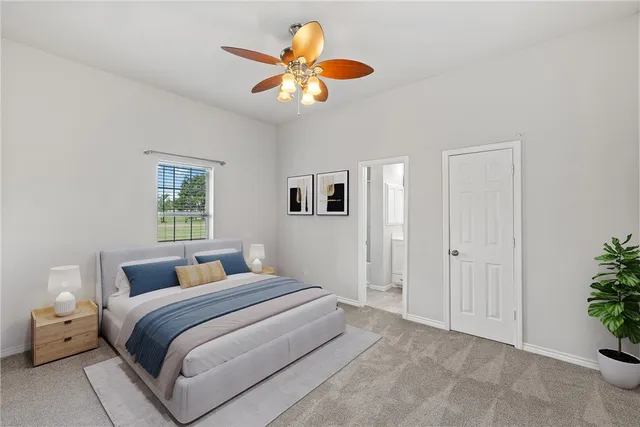 a bathroom with a sink toilet and vanity
