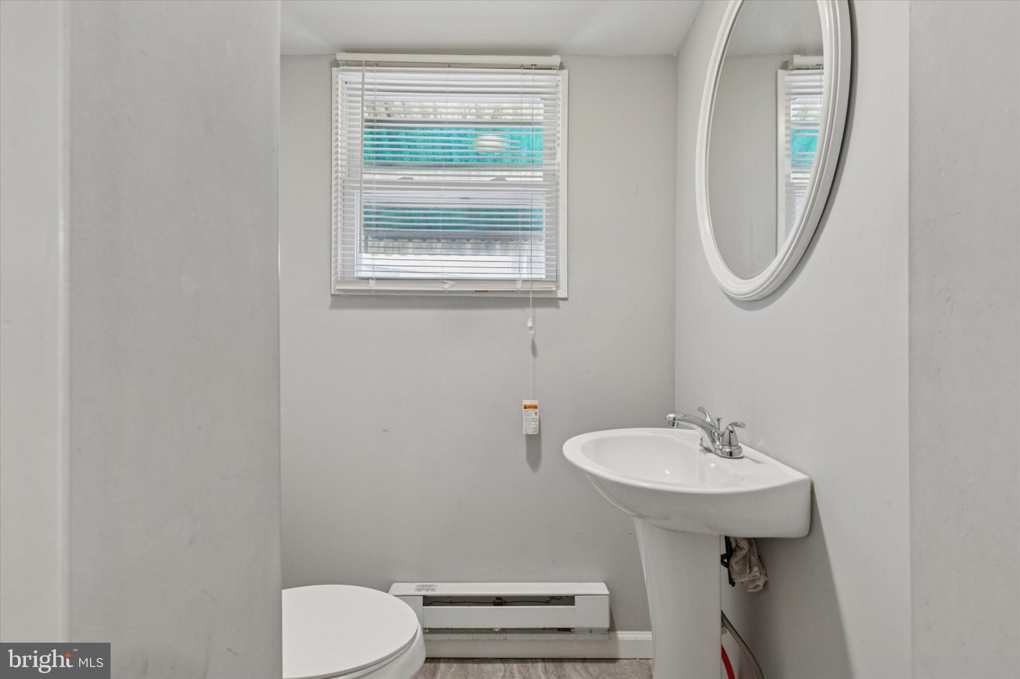 1815 Elston Street Philadelphia, PA 19126 - Photo 6 of 14 Bright and airy bathroom with modern touches.