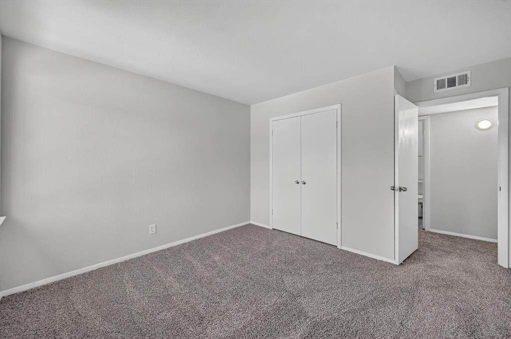 1801 East Grauwyler Road, Unit 101 Irving, TX 75061 - Photo 16 of 39 a view of an empty room and closet area