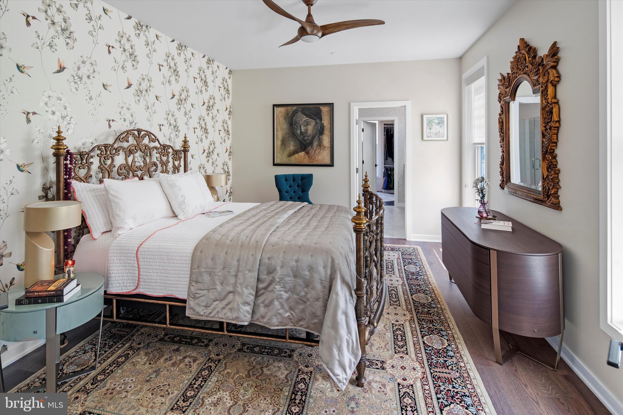 56 Umbrell Drive Eagleville, PA 19403 - Photo 15 of 28 a bed room with a bed and a chandelier