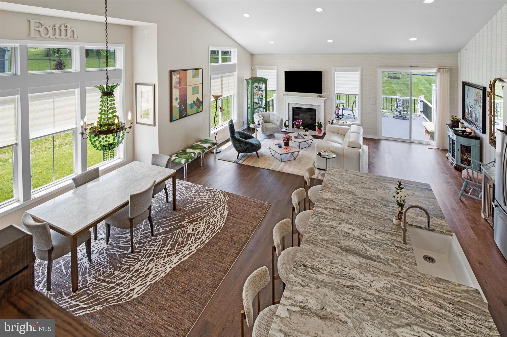 56 Umbrell Drive Eagleville, PA 19403 - Photo 18 of 28 a living room with furniture large window and wooden floor