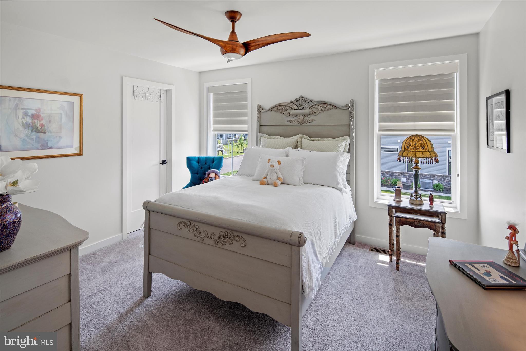 56 Umbrell Drive Eagleville, PA 19403 - Photo 21 of 28 a bedroom with a bed and a table