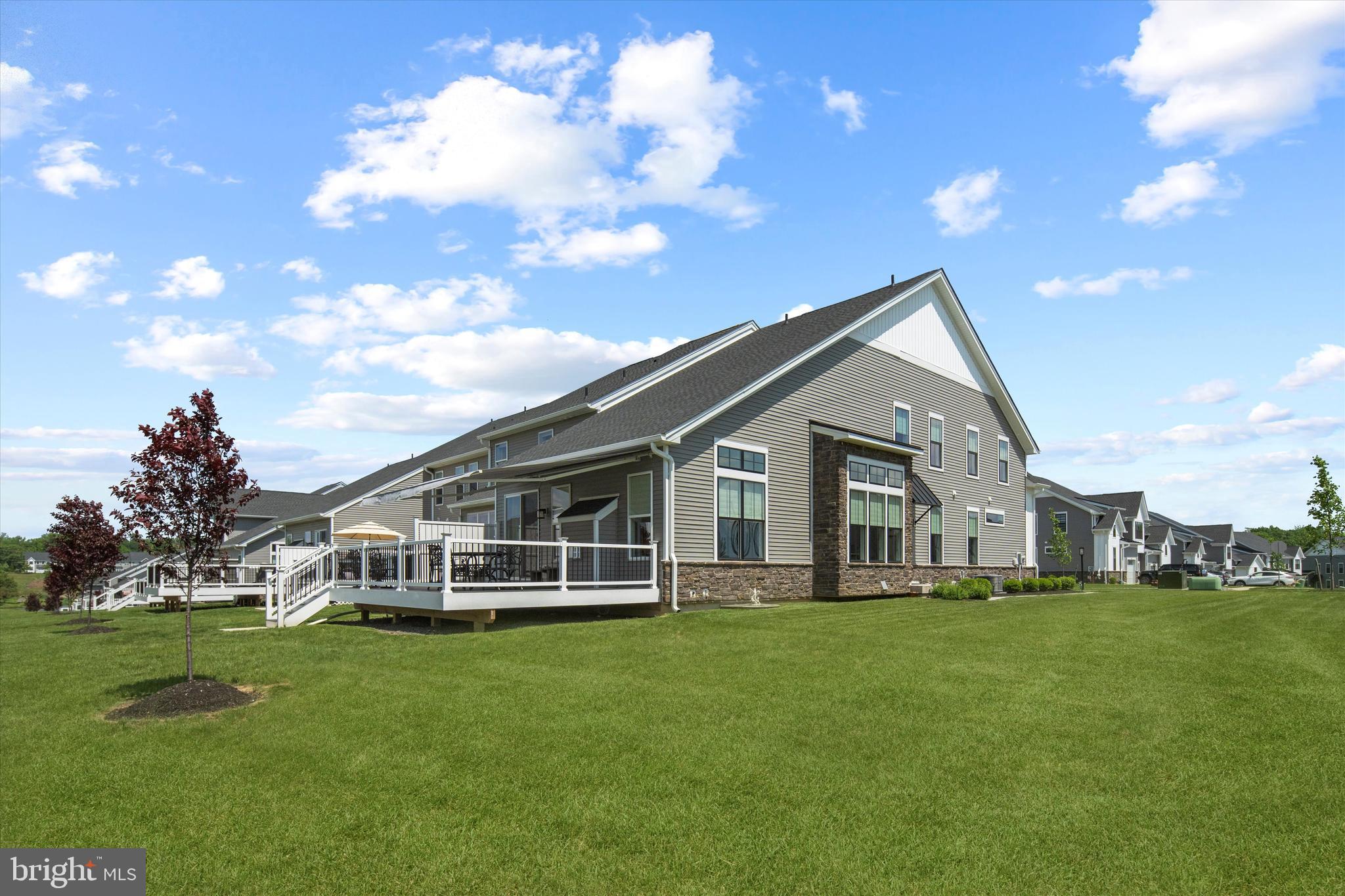 56 Umbrell Drive Eagleville, PA 19403 - Photo 3 of 28 a view of a house with a big yard