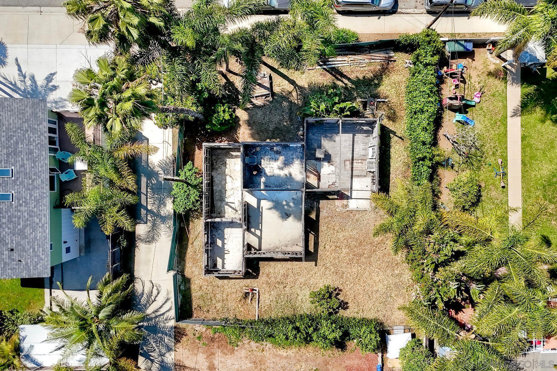 569 Hermes Avenue Encinitas, CA 92024 - Photo 3 of 16 an aerial view of a house with a yard and garden