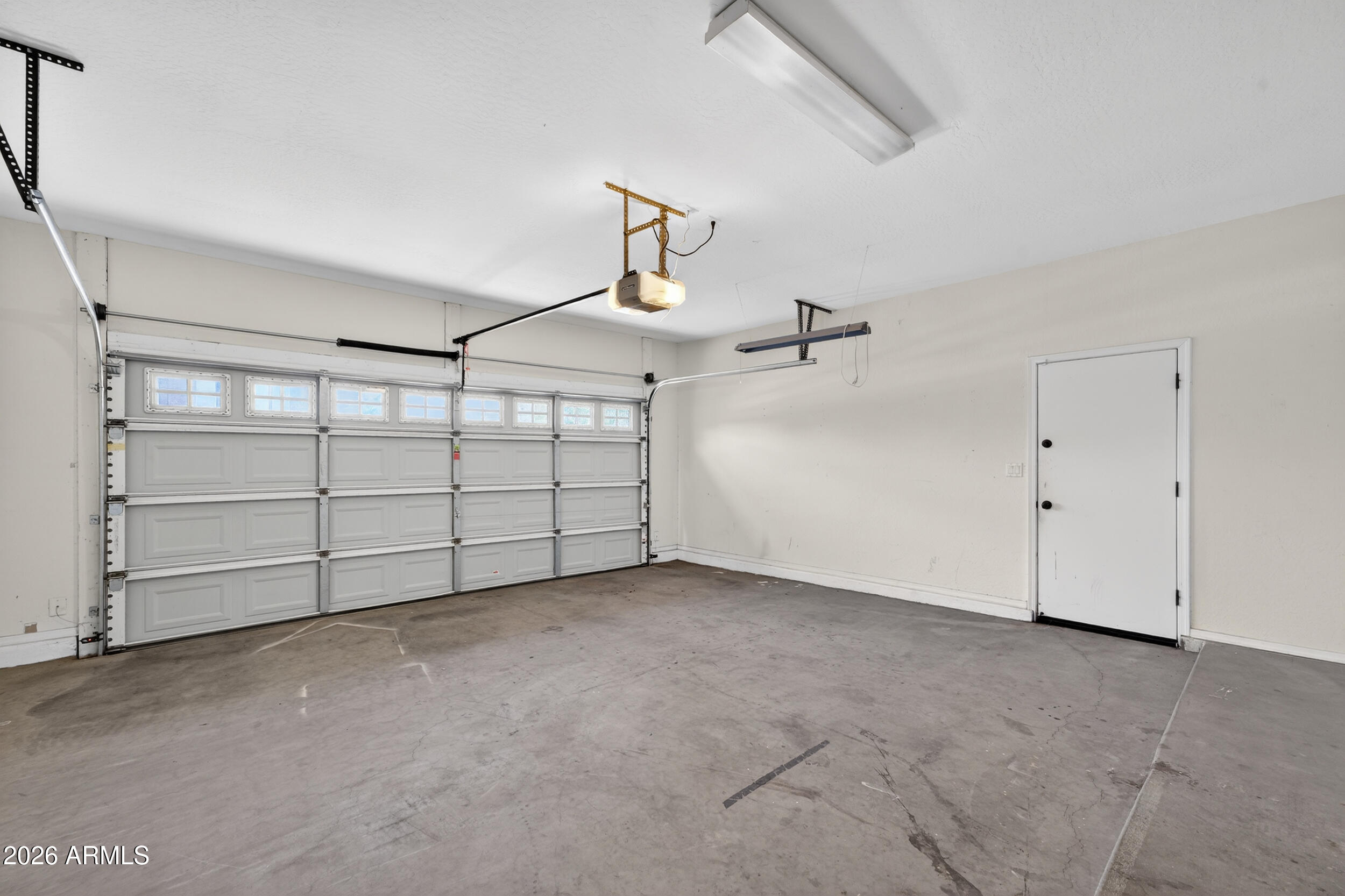 4199 North 154th Drive Goodyear, AZ 85395 - Photo 17 of 17 a view of a garage