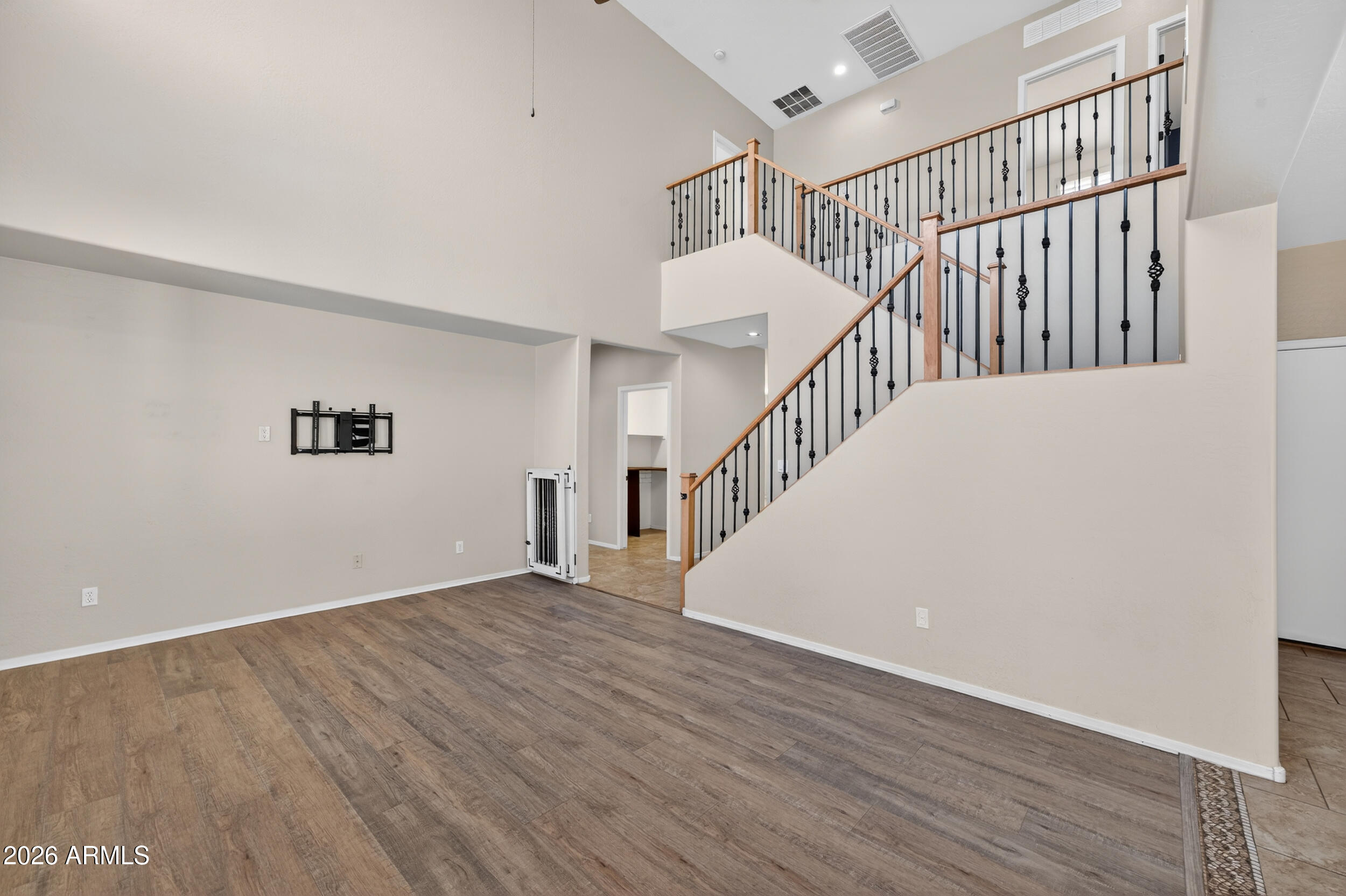 4199 North 154th Drive Goodyear, AZ 85395 - Photo 4 of 17 a view of entryway with wooden floor