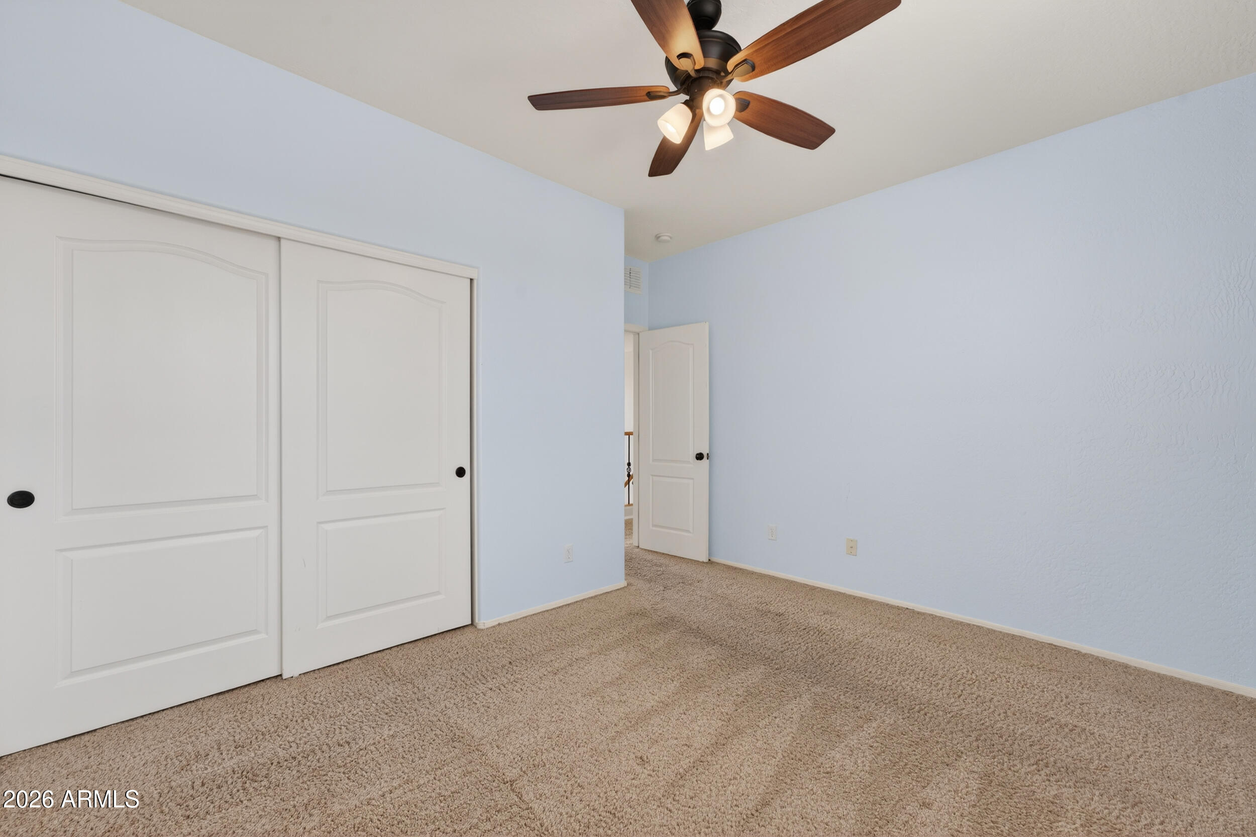 4199 North 154th Drive Goodyear, AZ 85395 - Photo 9 of 17 a view of an empty room