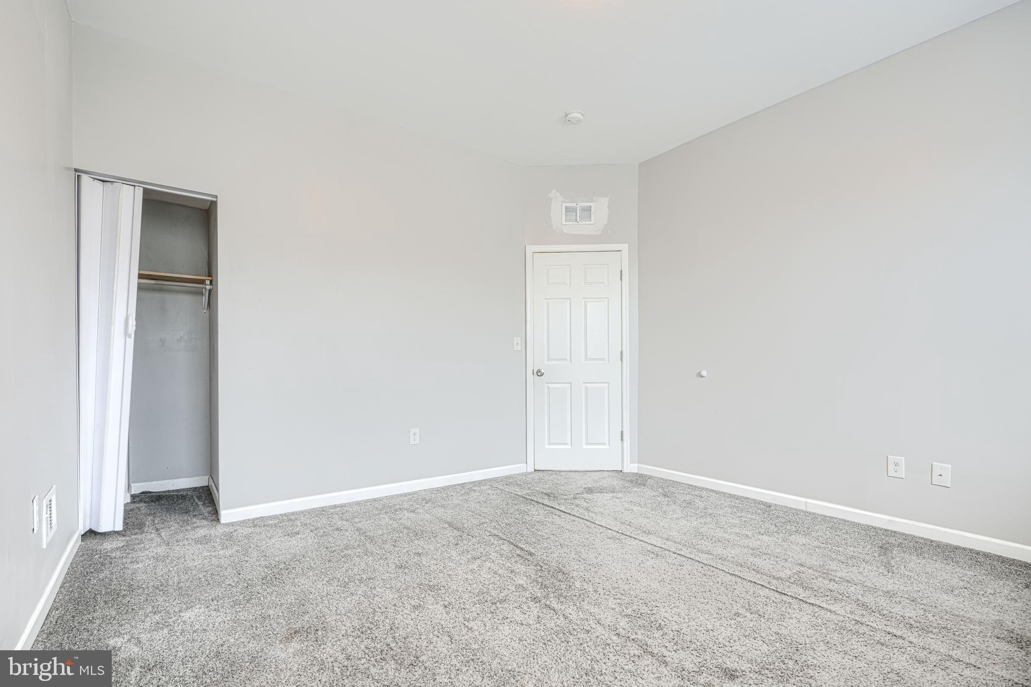 1702 East 32nd Street Baltimore, MD 21218 - Photo 24 of 38 a view of an empty room