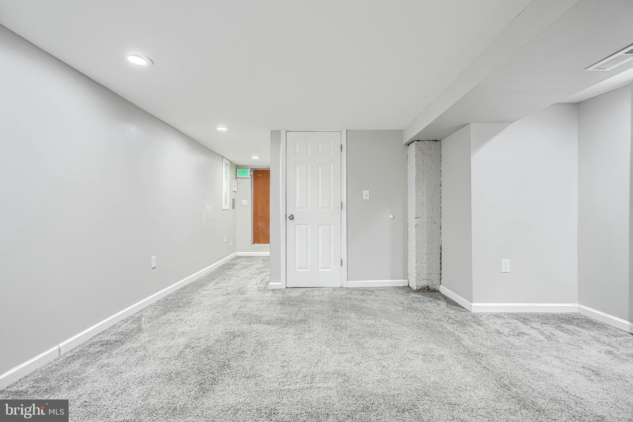 1702 East 32nd Street Baltimore, MD 21218 - Photo 29 of 38 a view of an empty room