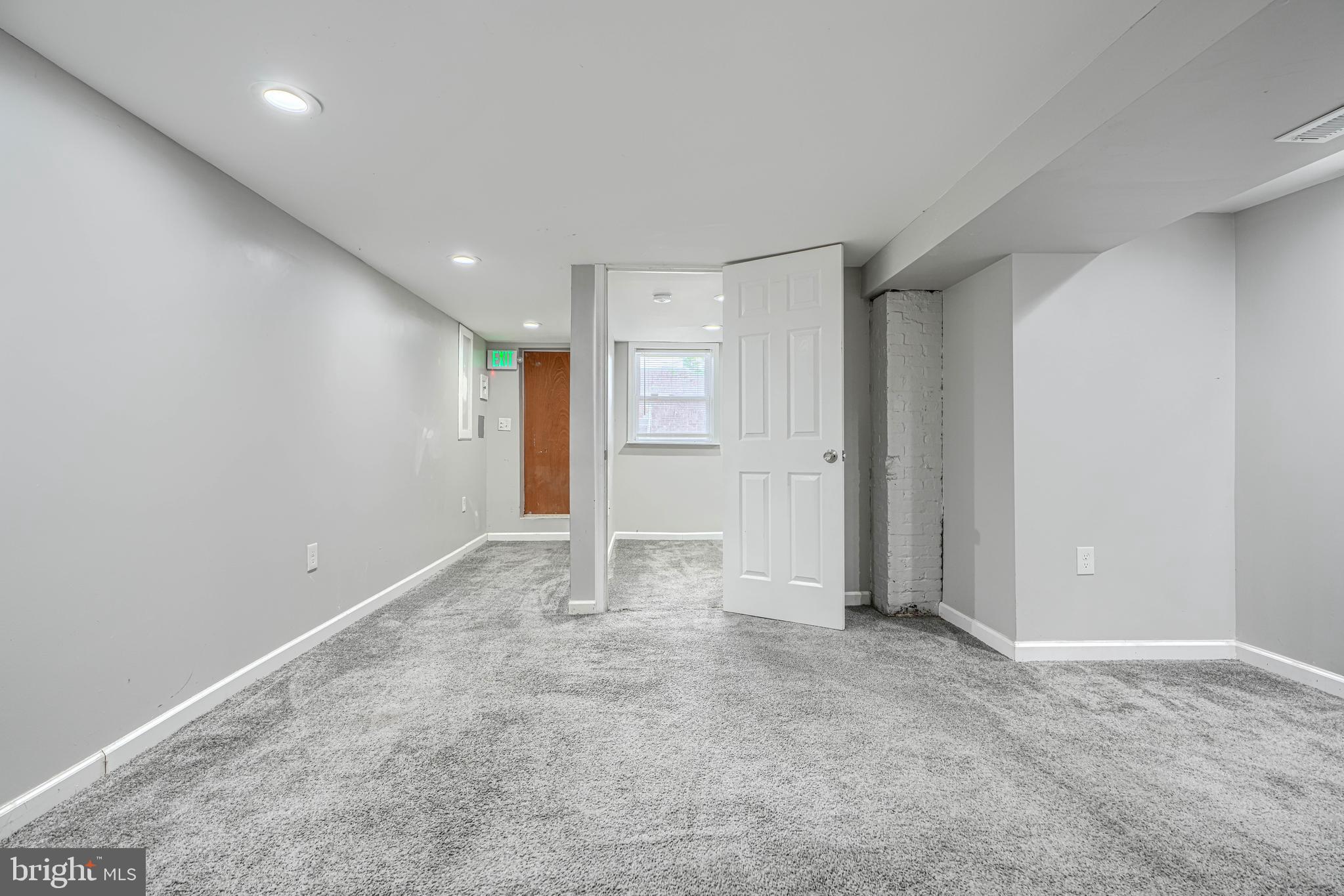 1702 East 32nd Street Baltimore, MD 21218 - Photo 31 of 38 a view of an empty room