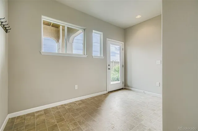 an empty room with windows