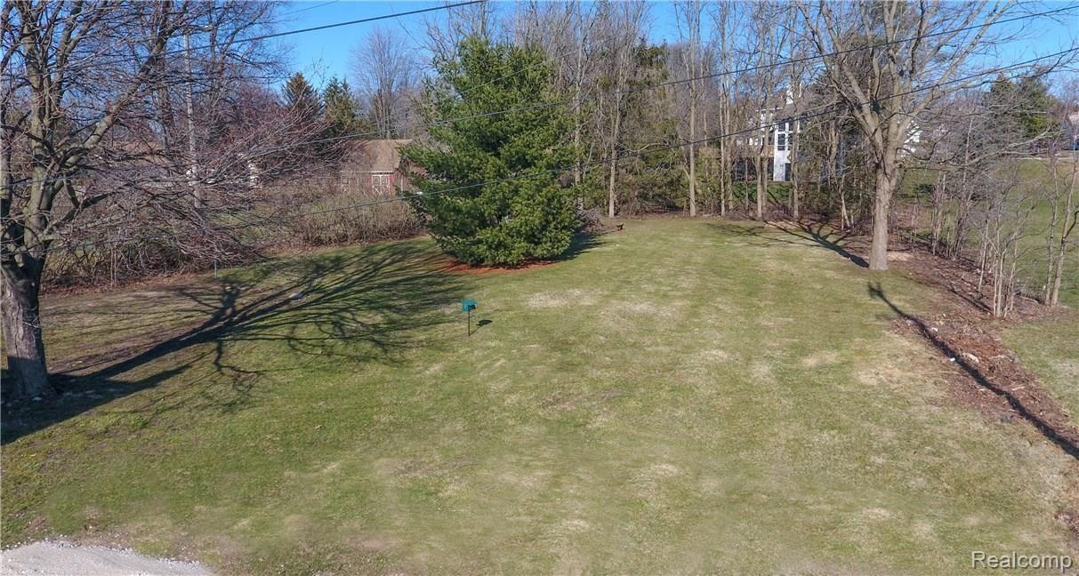 8980 Sashabaw Road Clarkston, MI 48348 - Photo 30 of 32 Massive Backyard