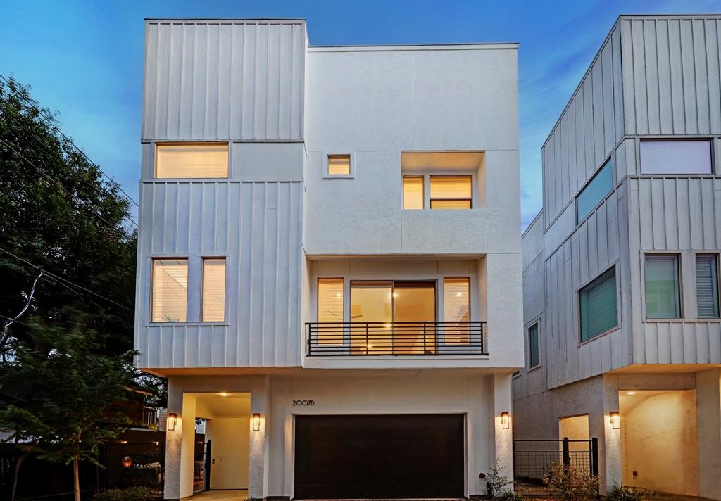 Modern elegance greets you from the curb with this sleek townhome façade