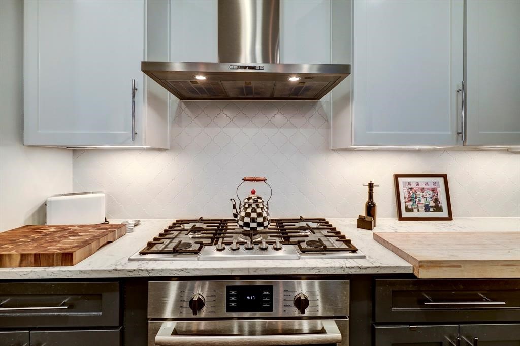 2007 Brun Street, Unit D Houston, TX 77019 - Photo 14 of 25 The seamless design, under-cabinet lighting and generous counter space for meal prep