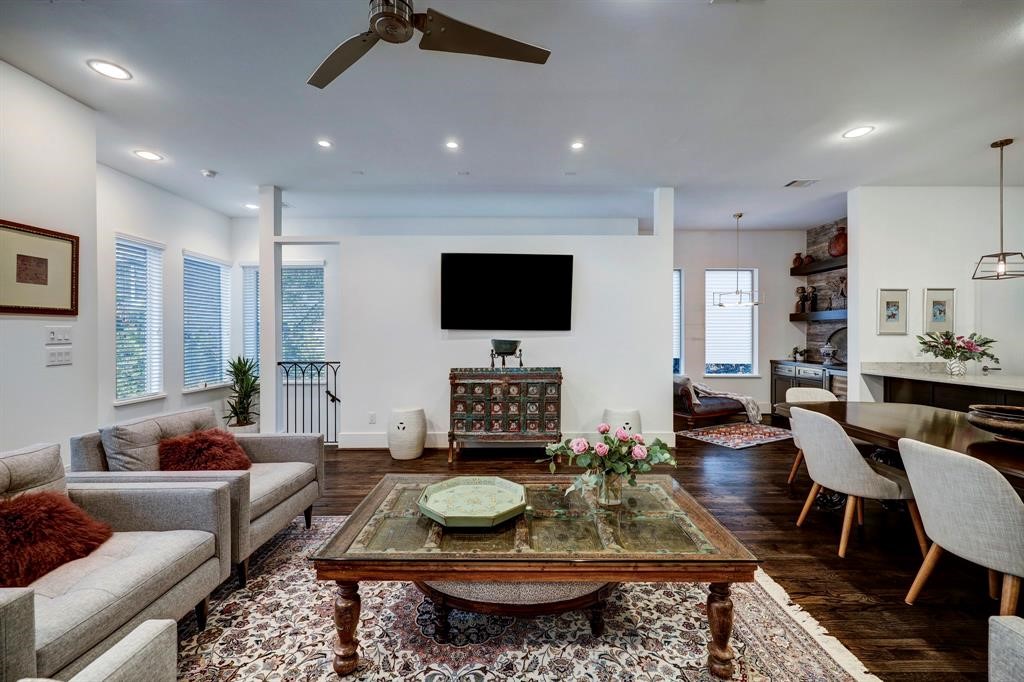 2007 Brun Street, Unit D Houston, TX 77019 - Photo 7 of 25 The home’s open-concept architecture, showcasing abundant natural light and clean design lines