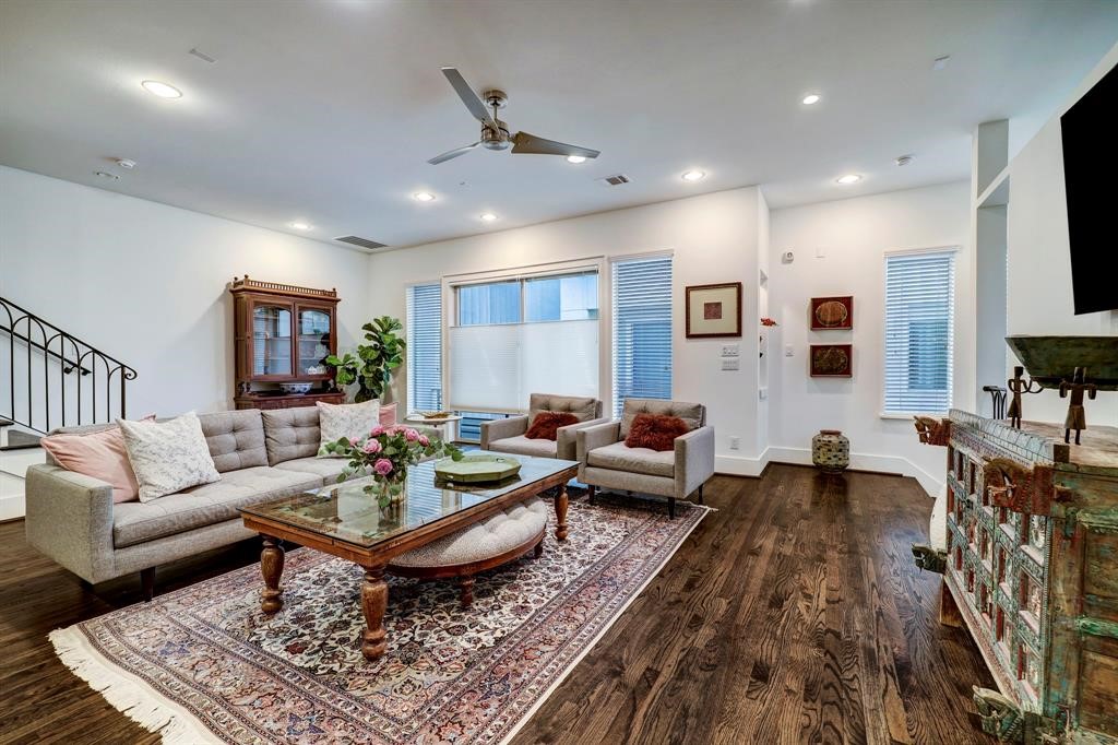 2007 Brun Street, Unit D Houston, TX 77019 - Photo 8 of 25 Bright and inviting living area enhanced by large windows that flood the space with natural light