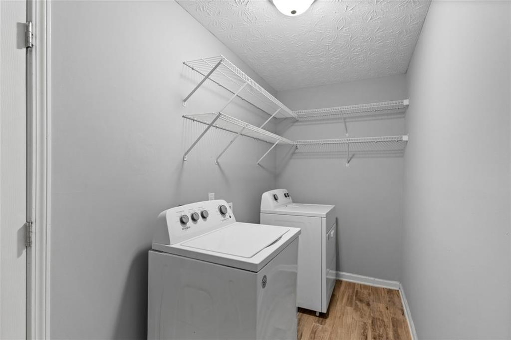 418 Ellerbe Drive Statham, GA 30666 - Photo 20 of 24 a utility room with dryer and washer