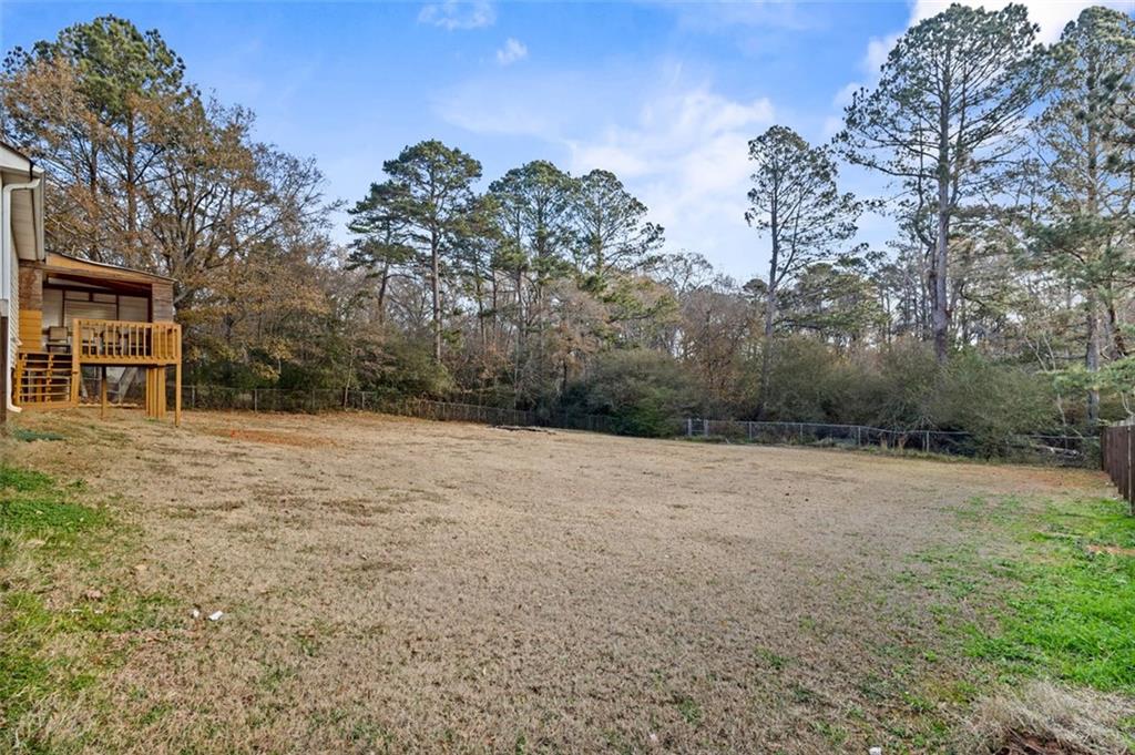 418 Ellerbe Drive Statham, GA 30666 - Photo 24 of 24 a view of a yard with a tree