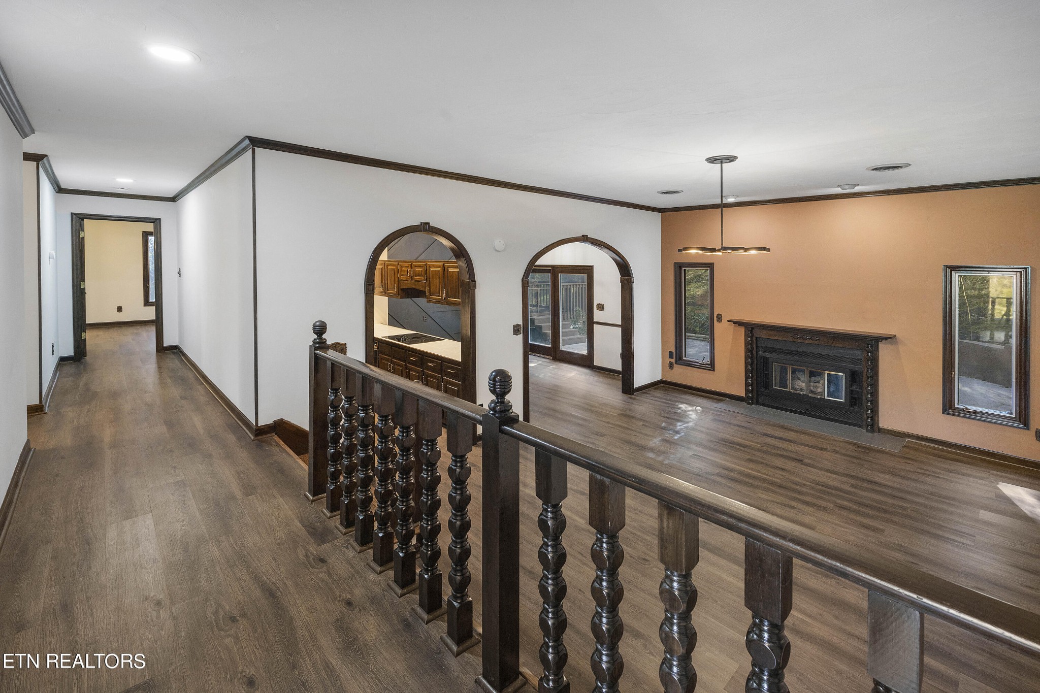 156 Hendrix Drive Oak Ridge, TN 37830 - Photo 6 of 34 a view of a hallway with wooden floor and staircase