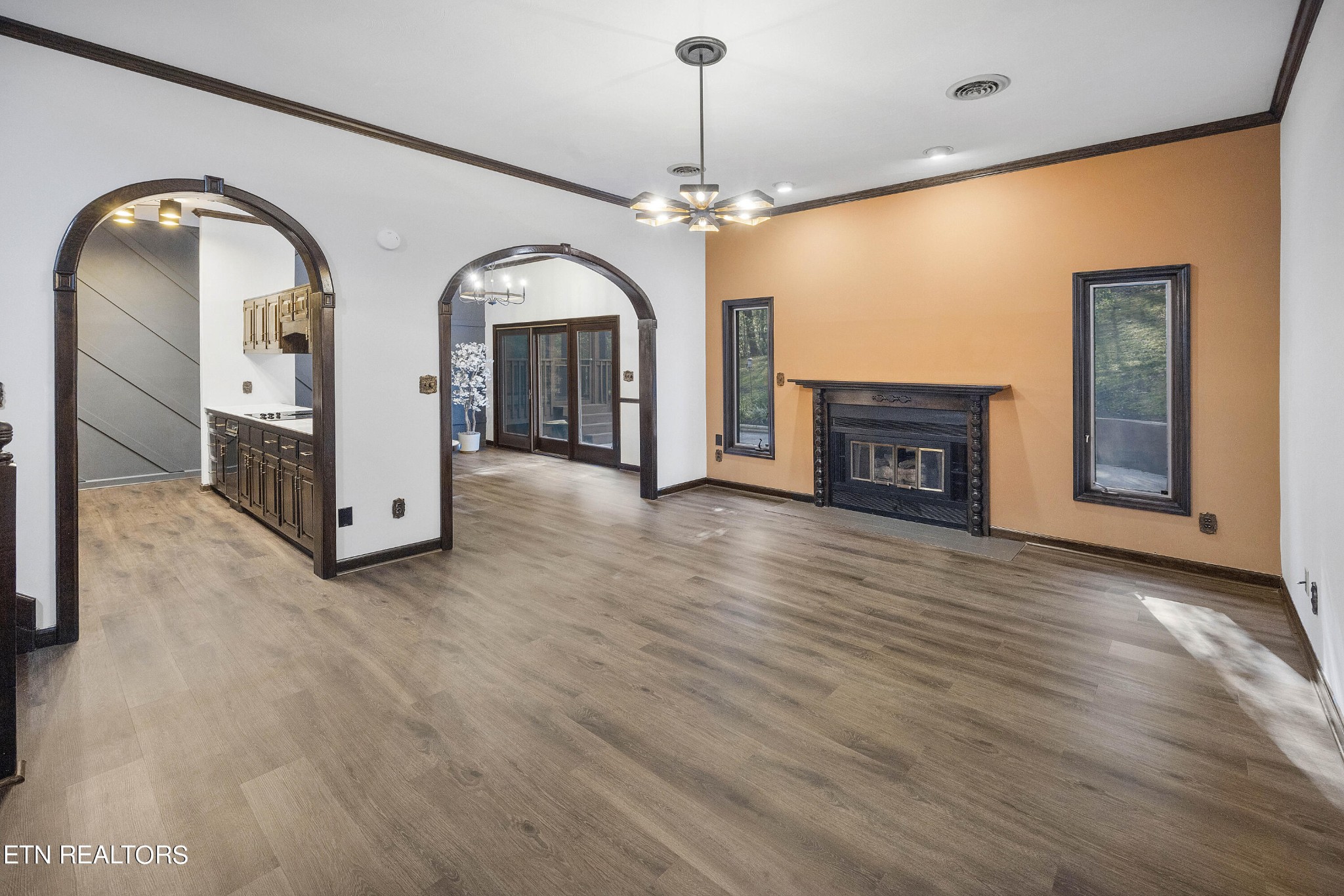 156 Hendrix Drive Oak Ridge, TN 37830 - Photo 8 of 34 a view of livingroom with fireplace and wooden floor