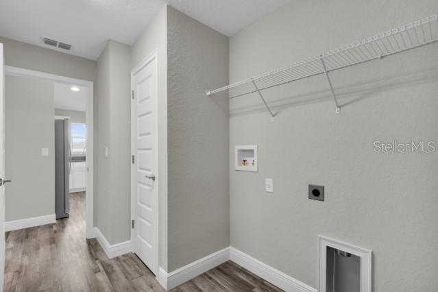 25 Locust Loop Lane Ocala, FL 34472 - Photo 13 of 35 a view of a room with wooden floor