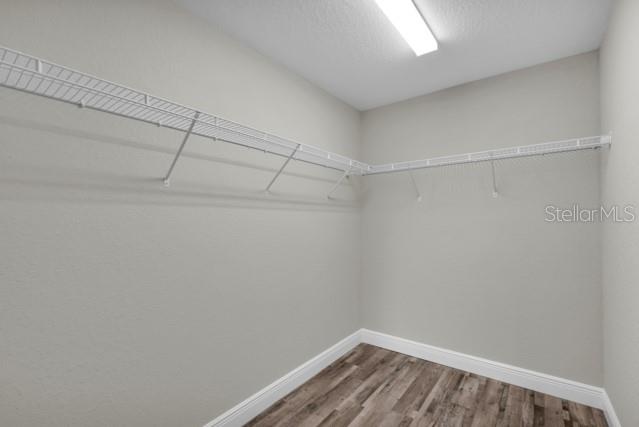 25 Locust Loop Lane Ocala, FL 34472 - Photo 16 of 35 a view of a room with racks on the wall