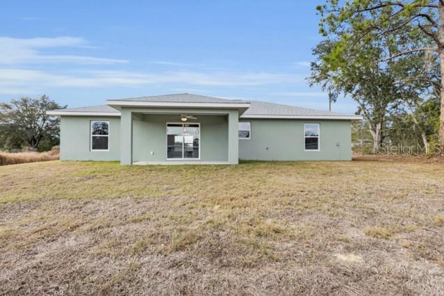 25 Locust Loop Lane Ocala, FL 34472 - Photo 34 of 35 a house with a outdoor space