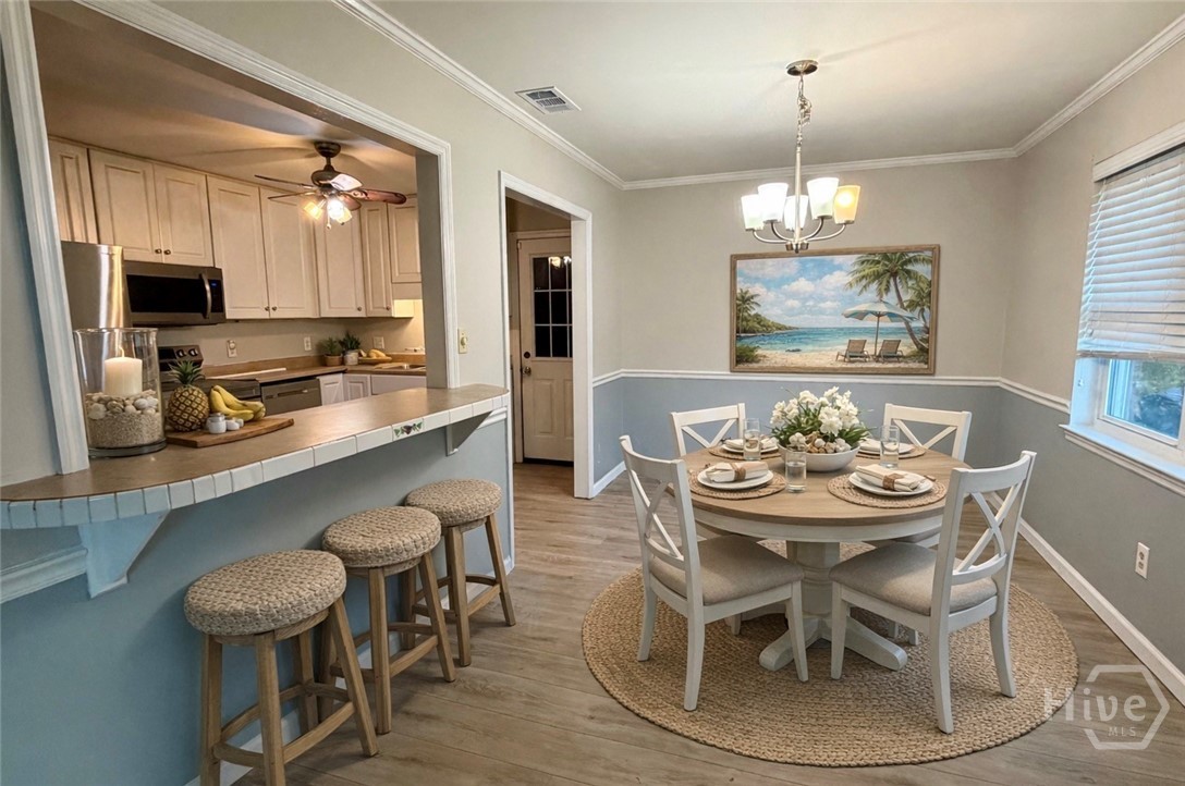 302 Burlington Road Savannah, GA 31410 - Photo 7 of 30 Digitally enhanced and virtually staged dining area