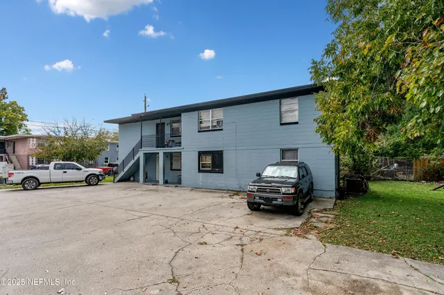 a car parked in front of a house