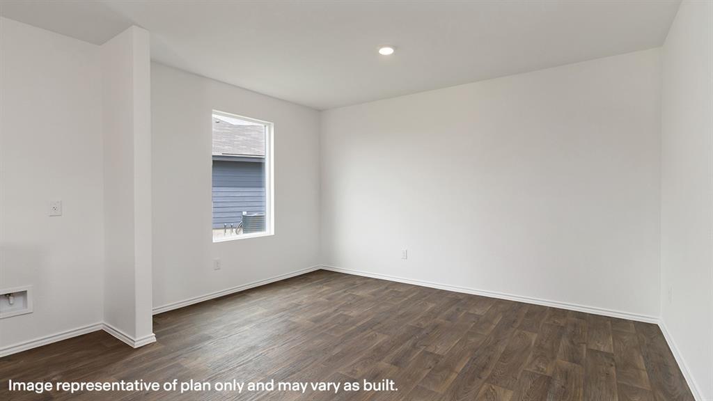 1711 Potomac Lane Blue Ridge, TX 75424 - Photo 14 of 26 an empty room with wooden floor and windows