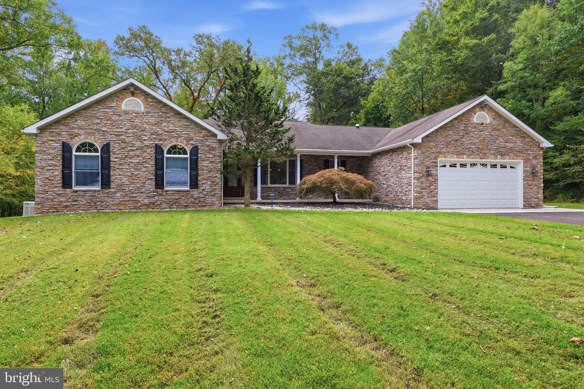 1669 Fennel Road Quakertown, PA 18951 - Photo 2 of 68 Beautiful stone-front ranch with covered entry