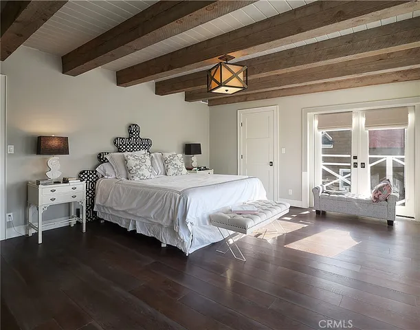 a bathroom with a double vanity sink and a toilet