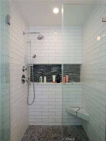 a view of a swimming pool with an outdoor seating