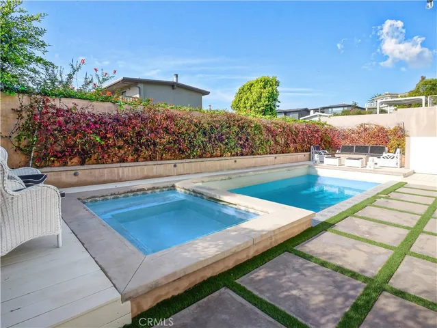 a patio with table and chairs