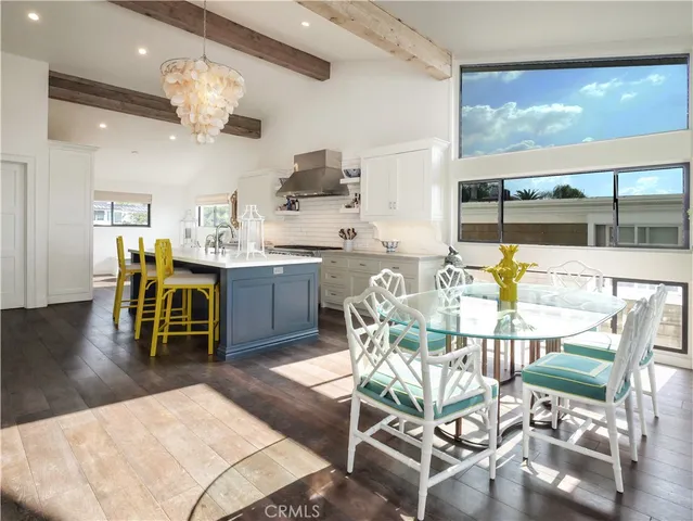 a living room with furniture a rug and a fireplace