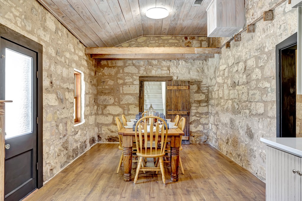 268 Marschall Creek Road Fredericksburg, TX 78624 - Photo 17 of 77 a dining room with furniture and window