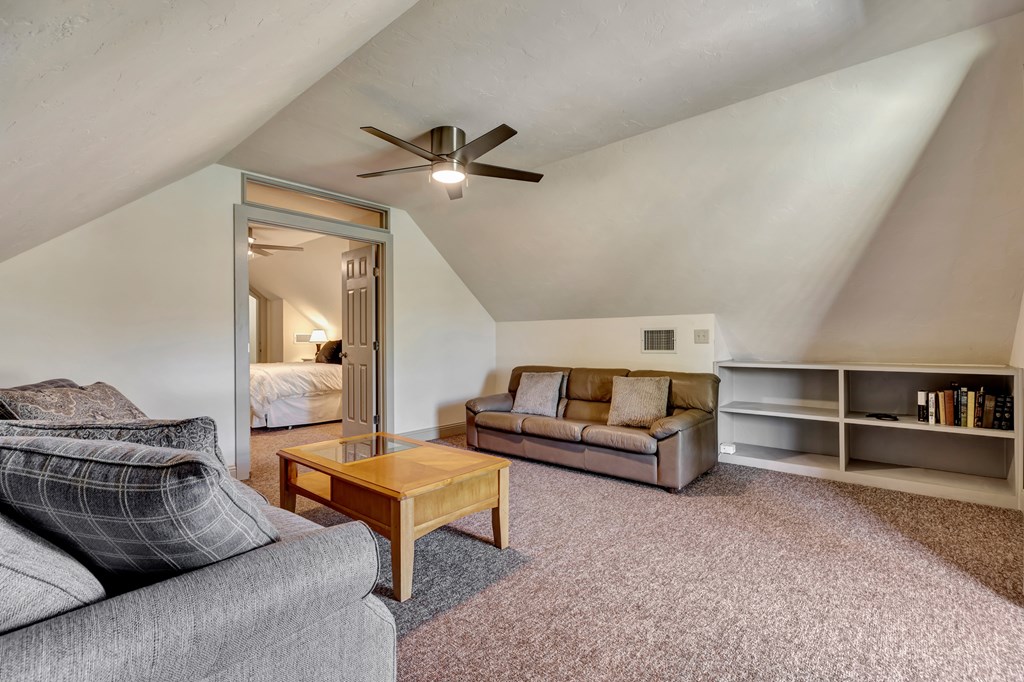 268 Marschall Creek Road Fredericksburg, TX 78624 - Photo 37 of 77 a living room with furniture and a wooden floor