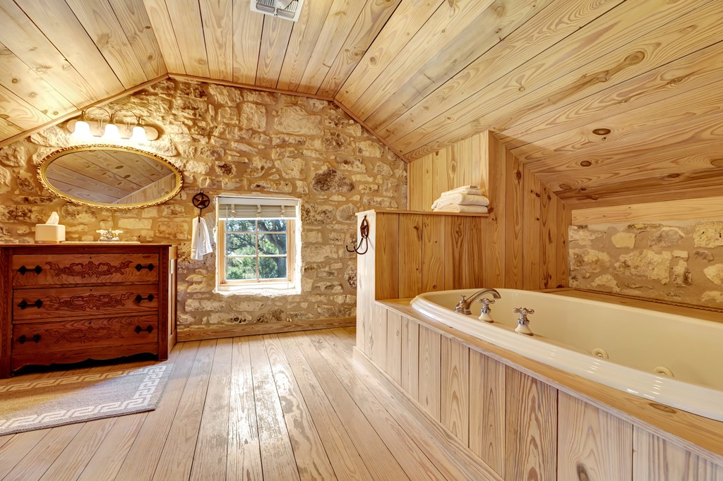 268 Marschall Creek Road Fredericksburg, TX 78624 - Photo 42 of 77 a bathroom with a tub a sink and a large window