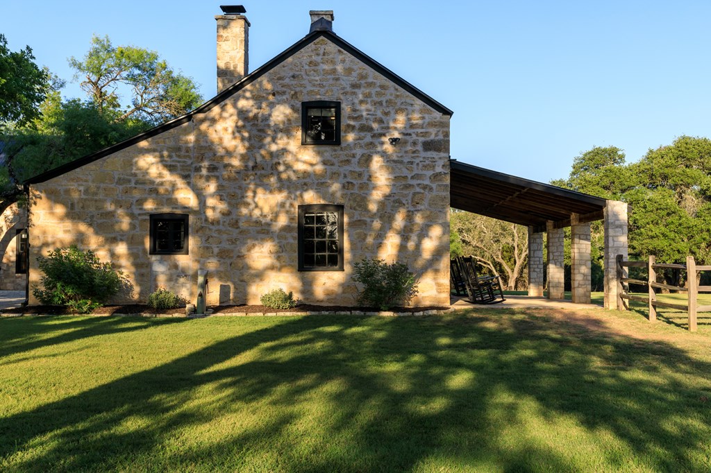 268 Marschall Creek Road Fredericksburg, TX 78624 - Photo 56 of 77 a front view of a house with a yard