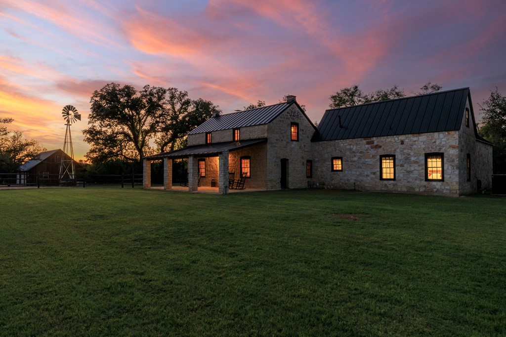 268 Marschall Creek Road Fredericksburg, TX 78624 - Photo 63 of 77 a front view of a house with a yard