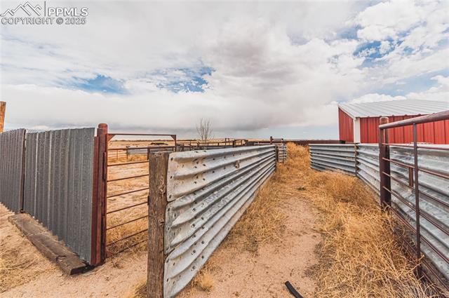 22885 Handle Road Calhan, CO 80808 - Photo 26 of 38 View of yard featuring an outbuilding